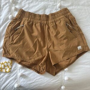 Vuori mustard yellow women’s dash shorts